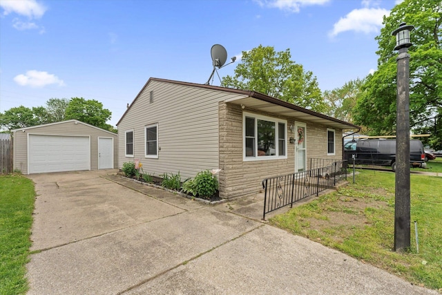 view of front of house featuring a garage, an outbuilding, concrete driveway, stone siding, and fence