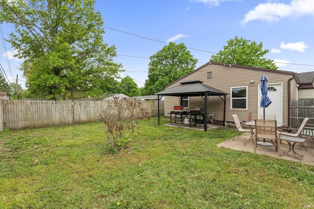 view of yard featuring a gazebo and a patio area