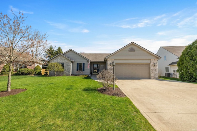 2009 Winding Creek Ln, Fort Wayne, IN 46804 - ranch-style home featuring an attached garage, driveway, central AC unit, a front yard, and stone siding