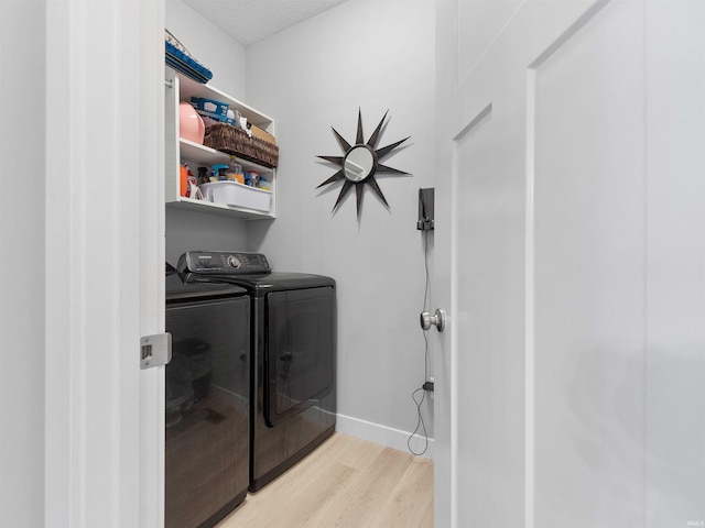 13655 Copper Strike Pass, Fort Wayne, IN 46845 - washroom with independent washer and dryer, light wood-style flooring, and baseboards