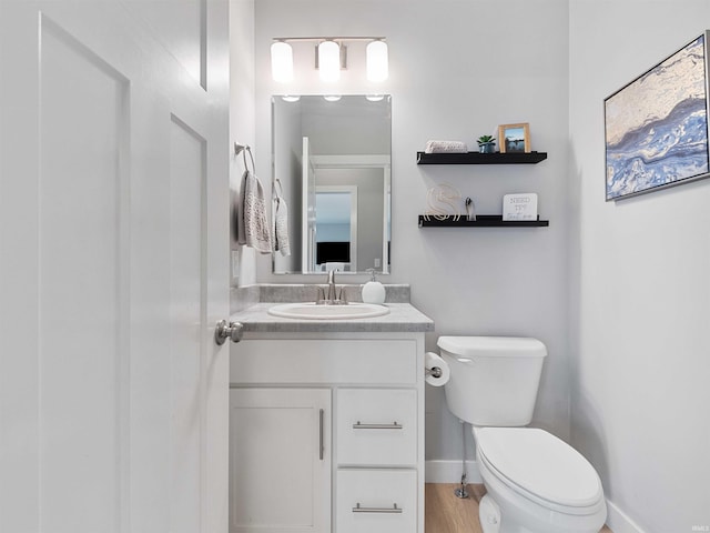 13655 Copper Strike Pass, Fort Wayne, IN 46845 - half bath featuring toilet, vanity, and baseboards