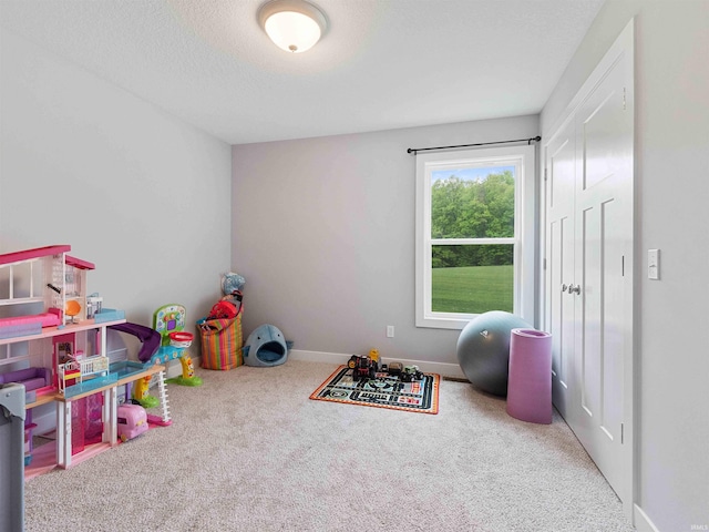 13655 Copper Strike Pass, Fort Wayne, IN 46845 - playroom featuring carpet floors and baseboards
