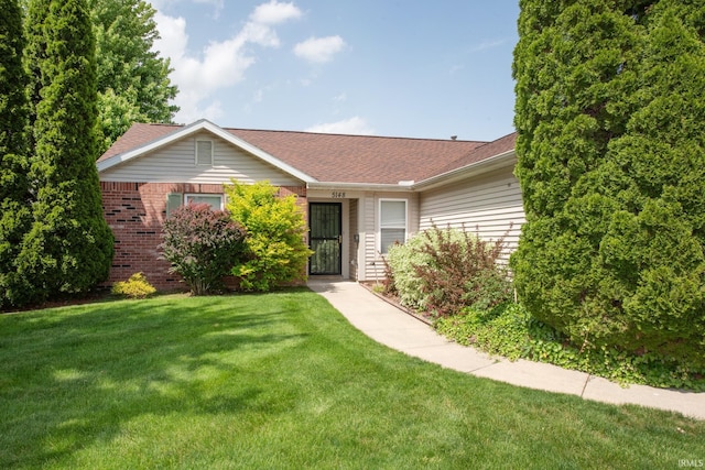 5148 Stable Dr, Lafayette, IN 47905 - single story home featuring a front yard and brick siding
