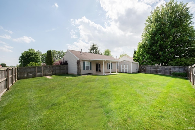 5148 Stable Dr, Lafayette, IN 47905 - back of house featuring a shed, an outdoor structure, and a patio area
