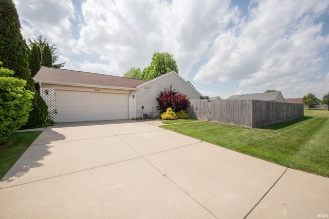 5148 Stable Dr, Lafayette, IN 47905 - view of front of home with an attached garage and driveway
