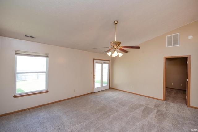 5148 Stable Dr, Lafayette, IN 47905 - empty room featuring ceiling fan, light carpet, baseboards, lofted ceiling, and a smoke detector