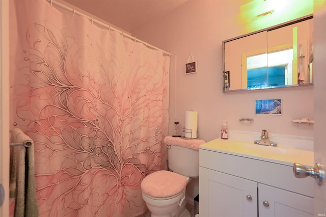 5200 Ojibway Dr, Kokomo, IN 46902 - bathroom with toilet, vanity, and a shower with shower curtain