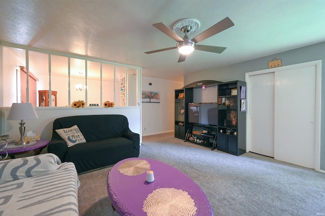 5200 Ojibway Dr, Kokomo, IN 46902 - carpeted living room with a ceiling fan