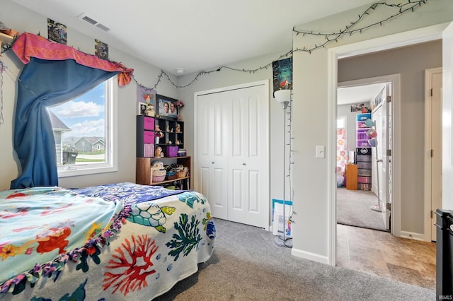 1806 Waynedale Dr, Garrett, IN 46738 - bedroom with carpet flooring, a closet, and baseboards