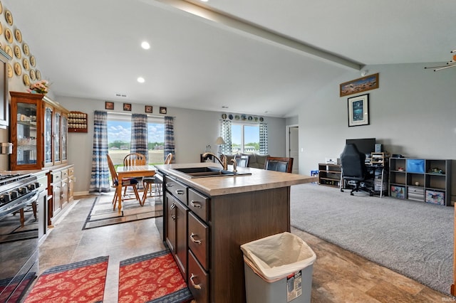 1806 Waynedale Dr, Garrett, IN 46738 - kitchen with a sink, open floor plan, black range with gas stovetop, an office area, and an island with sink