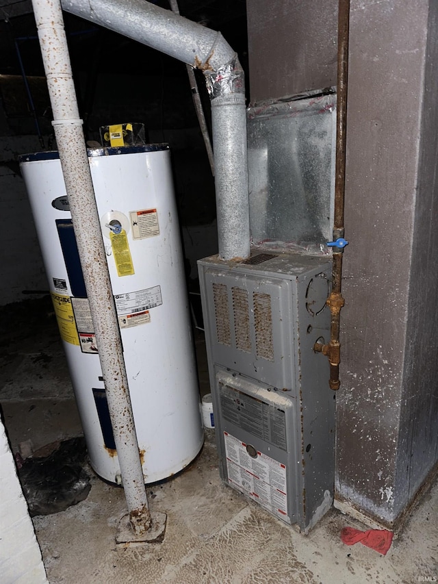 utility room with water heater and heating unit