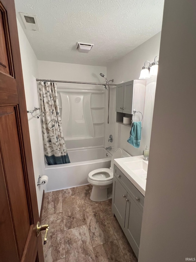 211 Mccutcheon Dr, Lafayette, IN 47909 - bathroom with shower / bathtub combination with curtain, vanity, toilet, and a textured ceiling