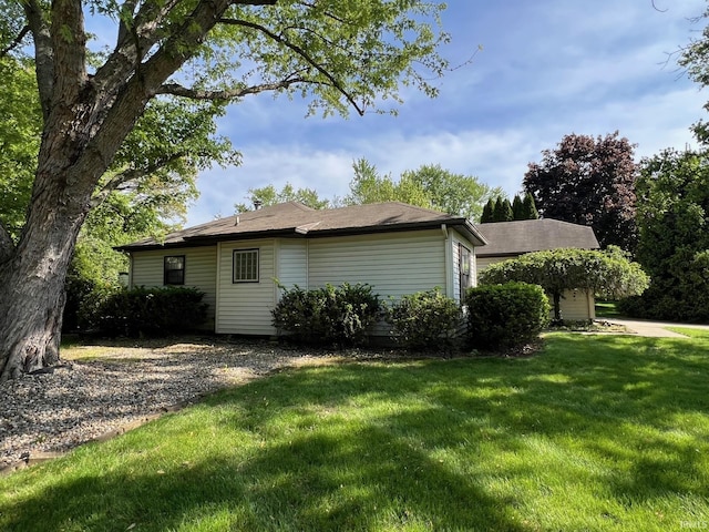 211 Mccutcheon Dr, Lafayette, IN 47909 - view of home's exterior with a yard