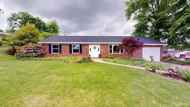 601 E 21st St, Ferdinand, IN 47532 - single story home featuring an attached garage, brick siding, a front yard, and driveway