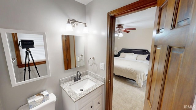 601 E 21st St, Ferdinand, IN 47532 - ensuite bathroom with a ceiling fan, vanity, and toilet