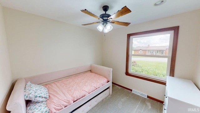 601 E 21st St, Ferdinand, IN 47532 - bedroom featuring carpet floors, baseboards, and a ceiling fan