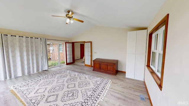 601 E 21st St, Ferdinand, IN 47532 - living area featuring a ceiling fan, french doors, light wood finished floors, vaulted ceiling, and baseboards