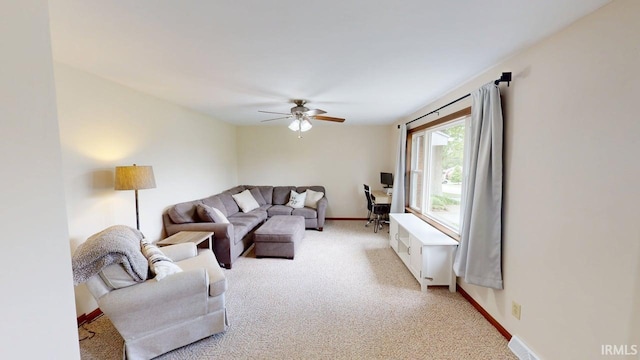 601 E 21st St, Ferdinand, IN 47532 - living area with a ceiling fan, carpet floors, and baseboards