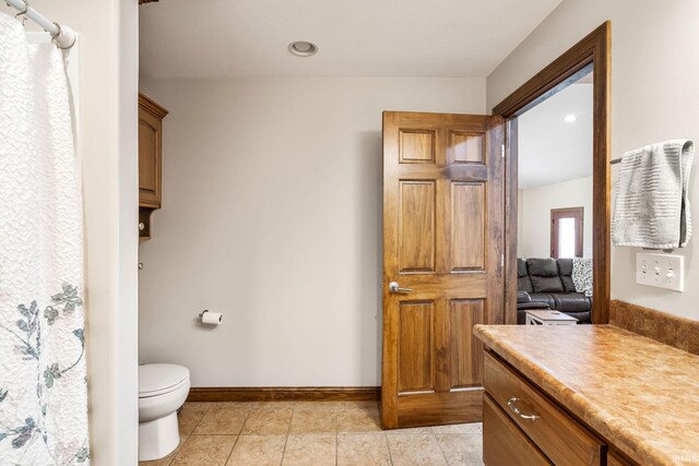 full bathroom with toilet, baseboards, tile patterned floors, recessed lighting, and a shower with curtain