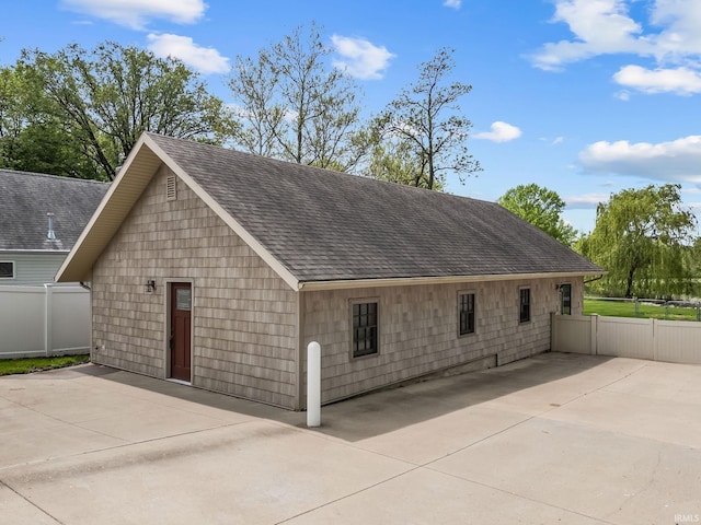 garage featuring fence