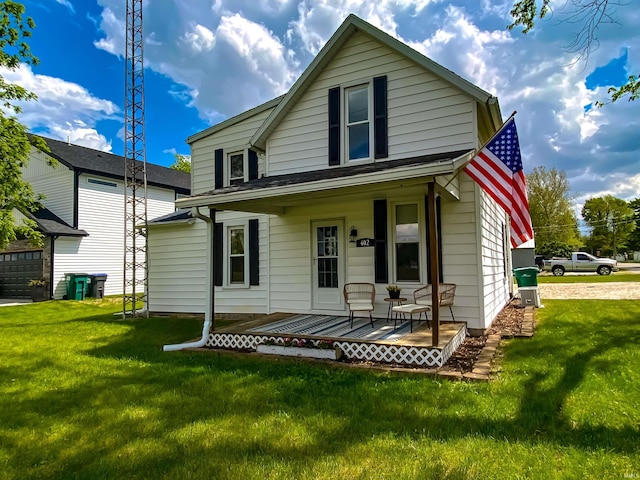 view of front of property featuring a porch and a front yard