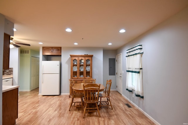 4101 Saddlebrooke Ln, Evansville, IN 47715 - dining space with recessed lighting, light wood-style floors, ceiling fan, baseboards, and electric panel