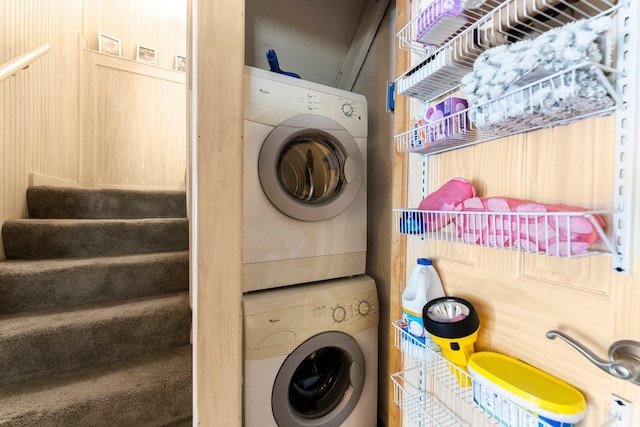 washroom with stacked washer and clothes dryer
