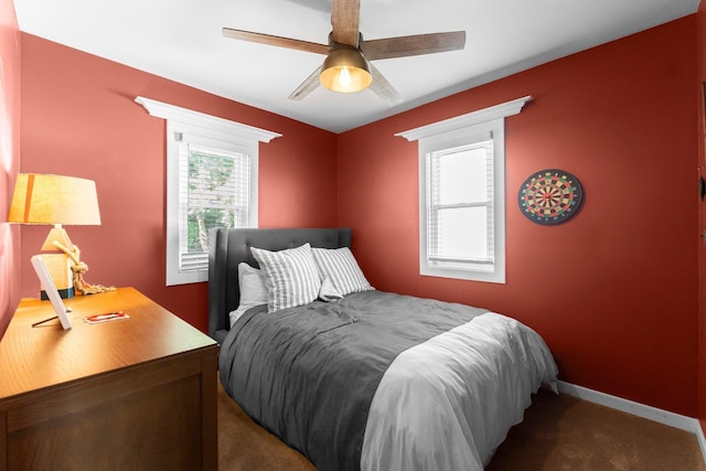 bedroom featuring carpet flooring, ceiling fan, and baseboards