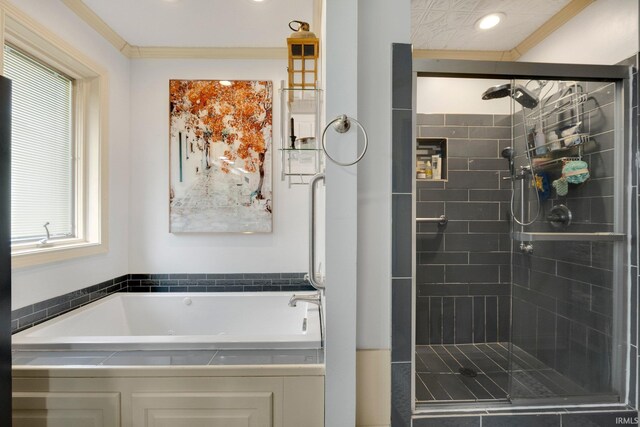 full bathroom featuring a stall shower, a garden tub, and recessed lighting