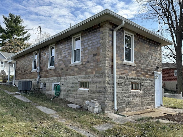 807 Walnut St, Oolitic, IN 47451 - view of side of property featuring central AC and fence