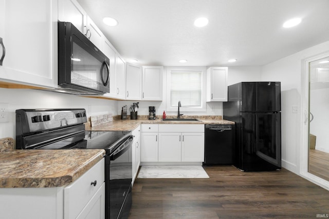 414 Monroe St, Monroeville, IN 46773 - kitchen featuring black appliances, a sink, recessed lighting, white cabinets, and dark wood finished floors