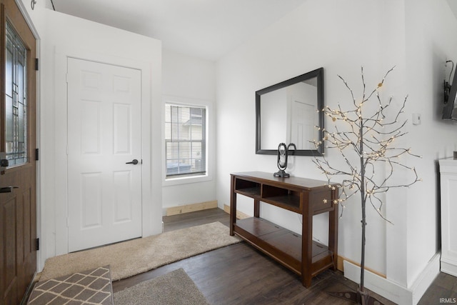 414 Monroe St, Monroeville, IN 46773 - entrance foyer with dark wood-type flooring and baseboards