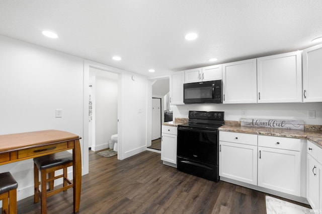 414 Monroe St, Monroeville, IN 46773 - kitchen with black appliances, white cabinetry, dark wood finished floors, recessed lighting, and light stone countertops