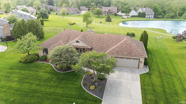 aerial view of residential area with a nearby body of water