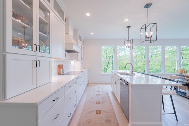 1846 E Cumberland Ter, Martinsville, IN 46151 - kitchen with a sink, stainless steel dishwasher, black electric cooktop, plenty of natural light, and recessed lighting