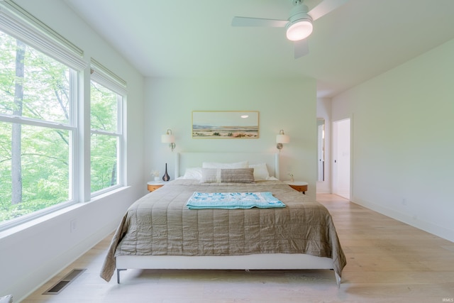 1846 E Cumberland Ter, Martinsville, IN 46151 - bedroom with light wood-style flooring, ceiling fan, and baseboards