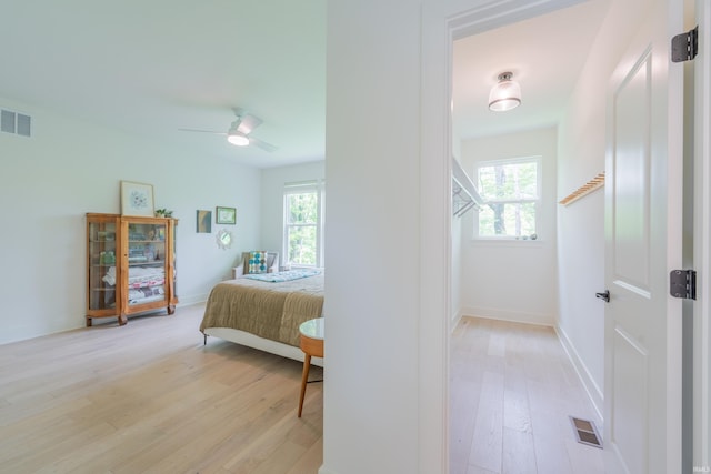 1846 E Cumberland Ter, Martinsville, IN 46151 - bedroom featuring light wood-type flooring, multiple windows, and ceiling fan