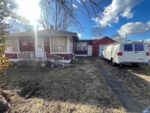 2911 S 9th St, Terre Haute, IN 47802 - single story home with a porch and a chimney