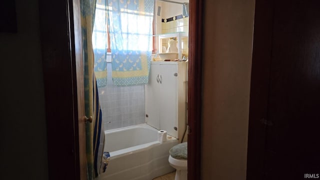 2911 S 9th St, Terre Haute, IN 47802 - full bathroom with toilet, shower / bathtub combination with curtain, and vanity