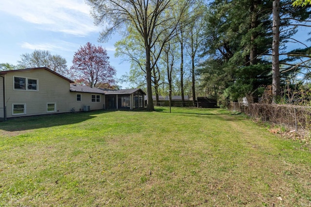view of yard with central AC