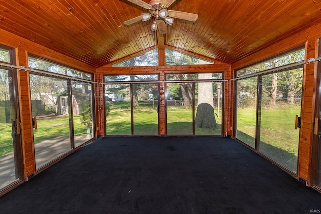 unfurnished sunroom featuring vaulted ceiling and ceiling fan