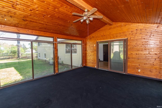 unfurnished sunroom featuring ceiling fan