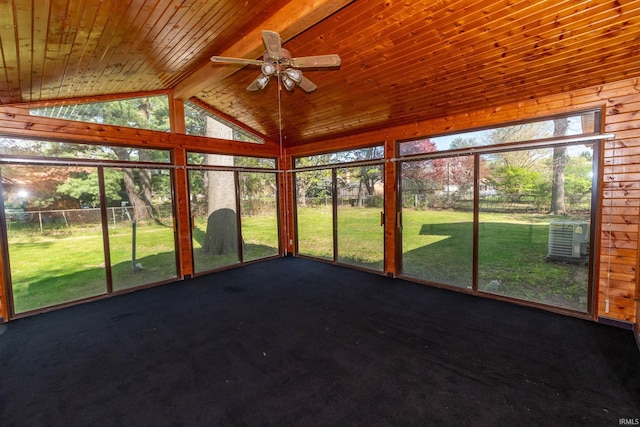 unfurnished sunroom featuring ceiling fan and plenty of natural light