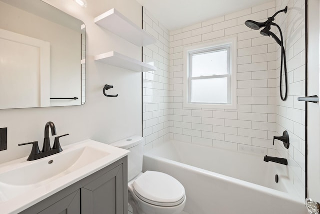 1425 Adams St, Lafayette, IN 47905 - bathroom featuring toilet, vanity, and shower / bathtub combination
