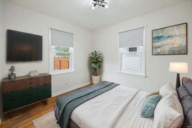 1425 Adams St, Lafayette, IN 47905 - bedroom with wood finished floors and baseboards