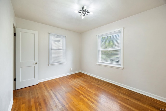 1425 Adams St, Lafayette, IN 47905 - unfurnished room with wood finished floors and baseboards