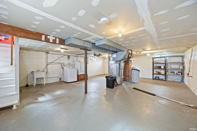 1425 Adams St, Lafayette, IN 47905 - unfinished basement featuring concrete block wall, independent washer and dryer, heating unit, and a sink