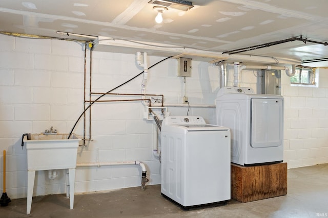 1425 Adams St, Lafayette, IN 47905 - clothes washing area with independent washer and dryer and concrete block wall