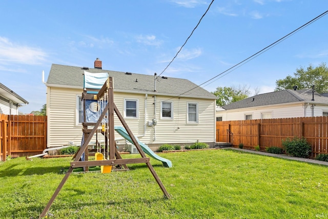 1425 Adams St, Lafayette, IN 47905 - rear view of house featuring a chimney, a playground, and roof with shingles