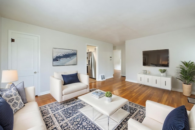1425 Adams St, Lafayette, IN 47905 - living area with wood finished floors and baseboards